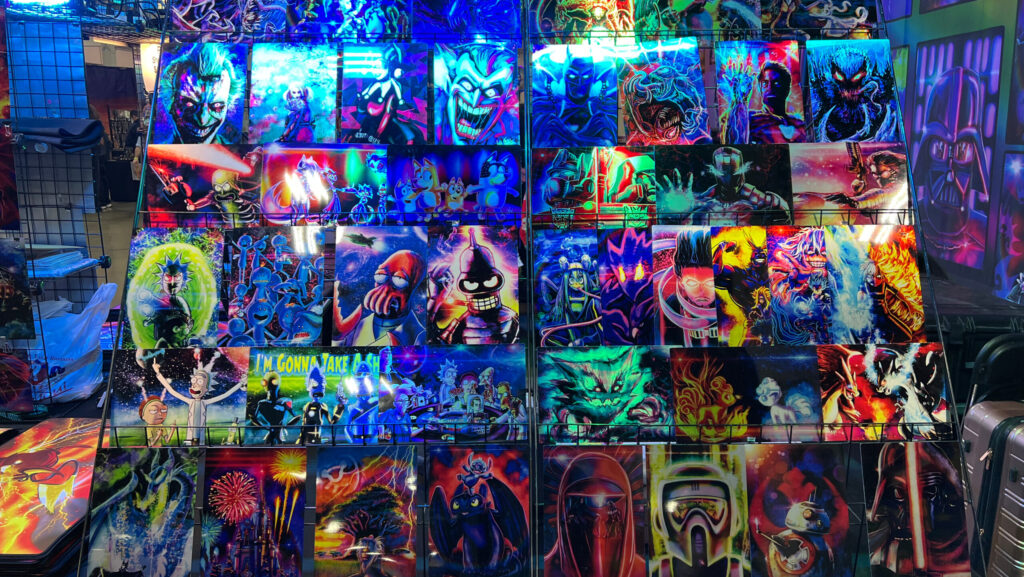 Artwork for sale at Motor City Comic Con on May 16, 2025, at Suburban Collection Showplace in Novi, Mich.
