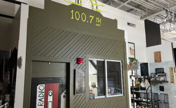 A photo of the exterior of 100.7 Ferndale Radio's studio at the Rust Belt Market.