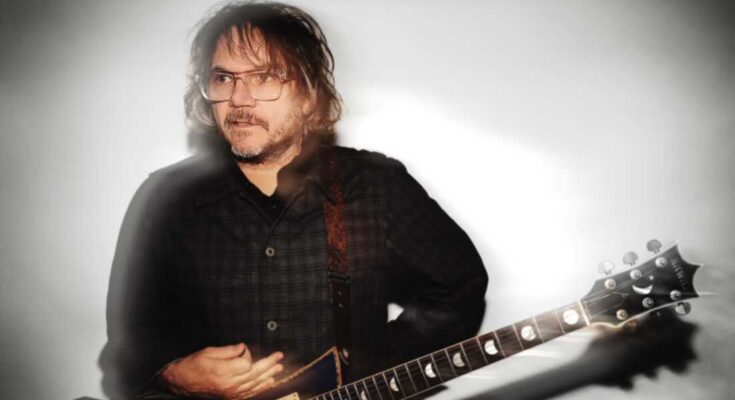 Jeff Tweedy with a guitar