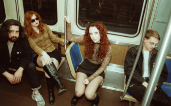 Promotional photo of the band Pool Kids in a subway train.