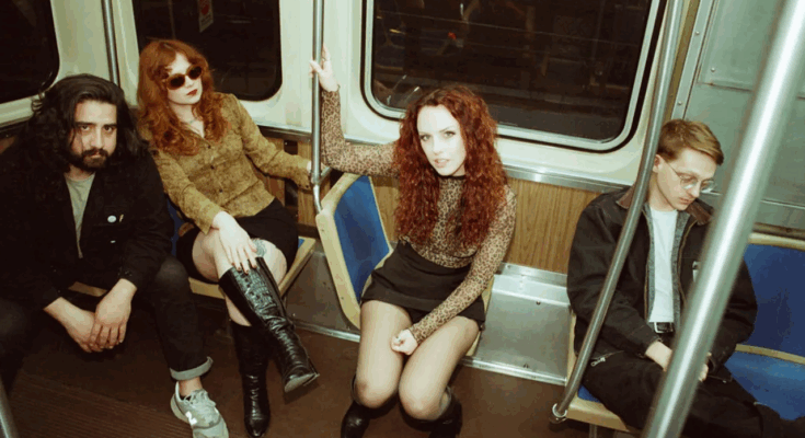 Promotional photo of the band Pool Kids in a subway train.