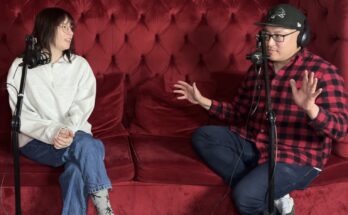 Shortly's Alex Maniak and Ferndale Radio's Dave Kim sit on a red couch during an interview.