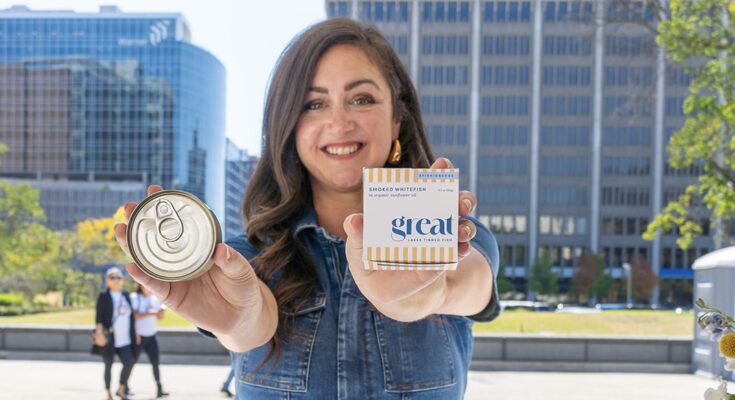 Great Lakes Tinned Fish founder Marissa Fellows poses in downtown Grand Rapids, Michigan.