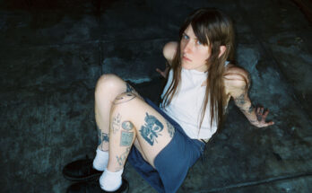 Artist Lala Lala posing for a promo photo.