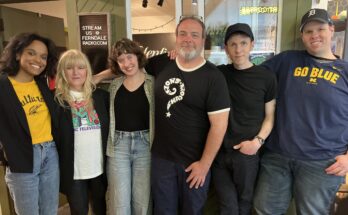 The 11th Hour hosts and Jeff and Mike Milo poses in front of the Ferndale Radio studio.