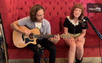 Bluhm performing an acoustic song.