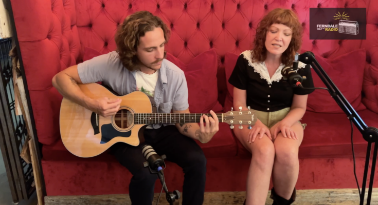 Bluhm performing an acoustic song.